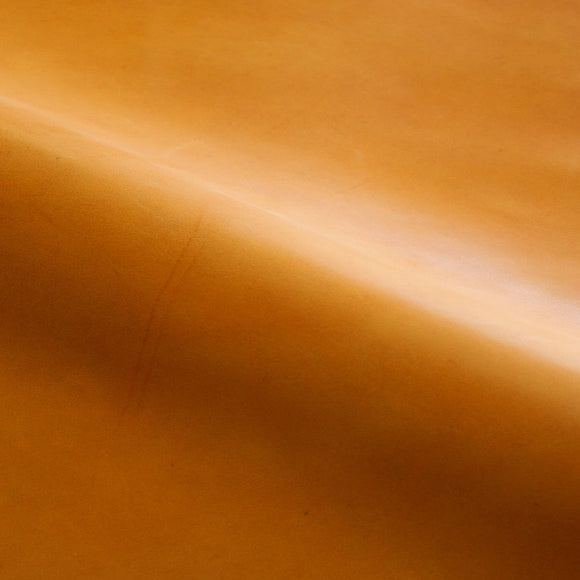 Full grain vegetable tanned mustard leather used in leather craft